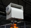 Video camera supporting device that fits into the top of the mast